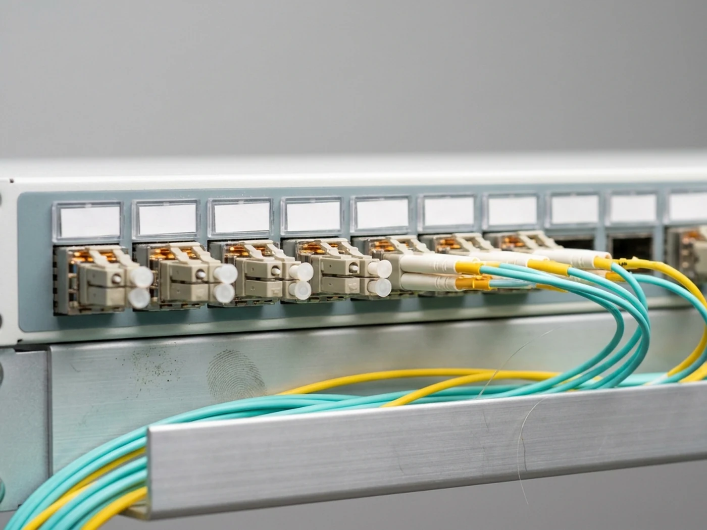 Fibre patch panel with every port clearly labelled to a recognized administration scheme, ready for remote hands